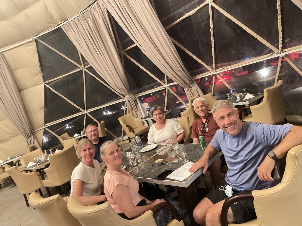 Rachel Friem sharing dinner with her father, stepmother, husband, and extended family during their Egypt and Jordan trip.