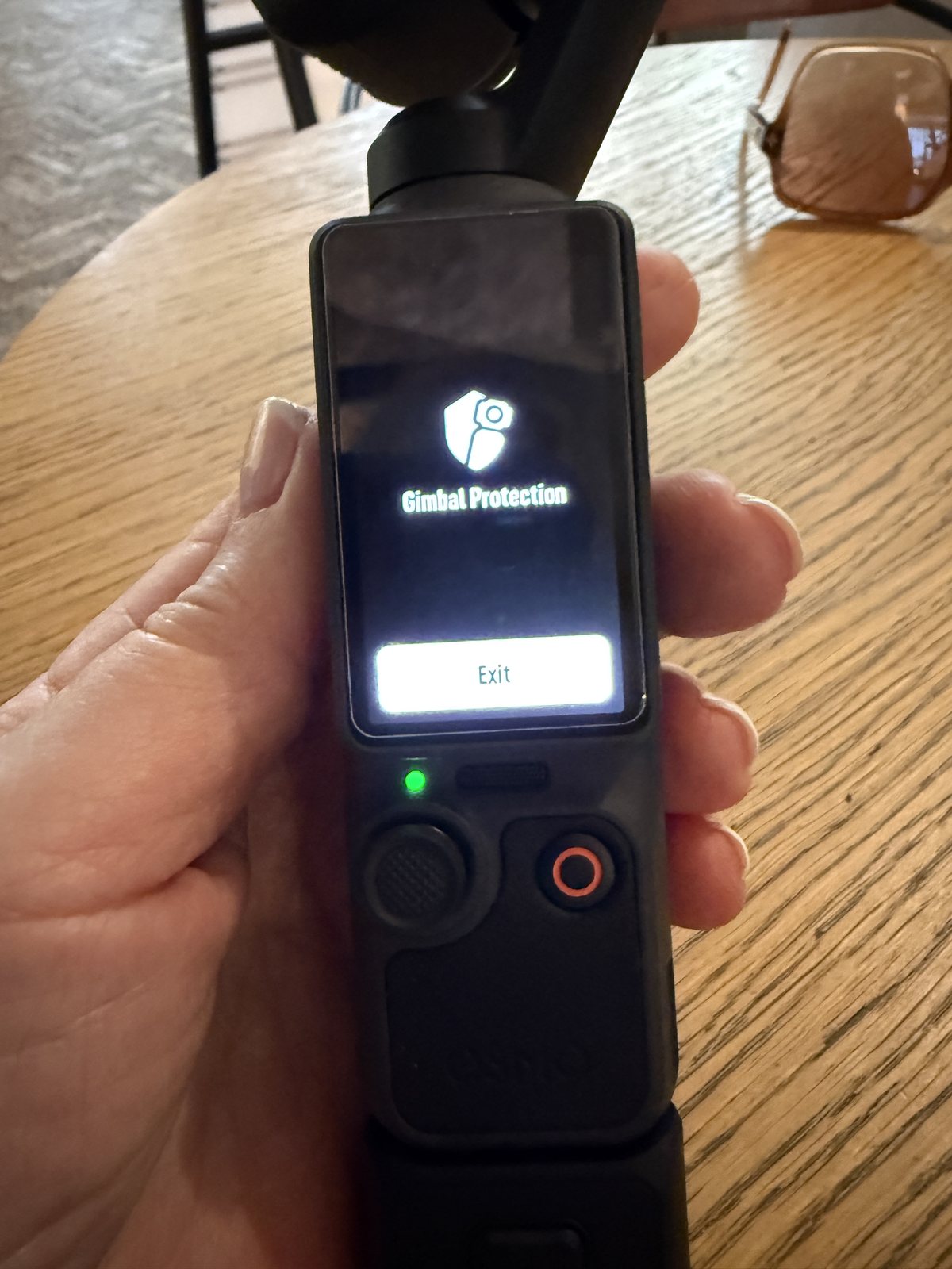 DJI Osmo Pocket 4 displaying a gimbal protection error after an accidental fall